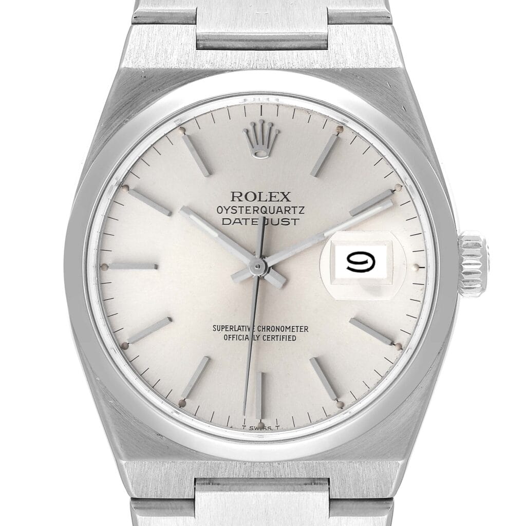 Silver Rolex Oysterquartz Datejust 17000 watch showing the date 9 and featuring a stainless steel bracelet.