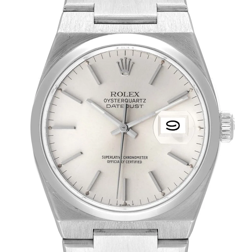 Silver Rolex Oysterquartz Datejust 17000 watch showing the date 9 and featuring a stainless steel bracelet.