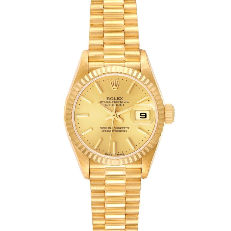 Gold Rolex Datejust 79178 wristwatch with a gold dial, date display, and gold link bracelet, viewed from above.