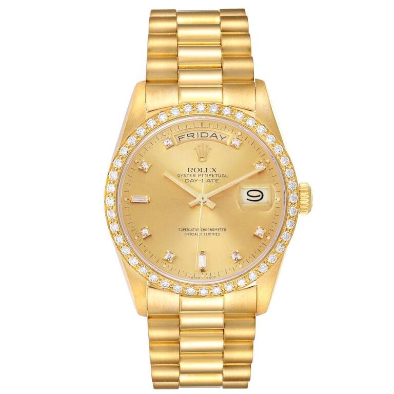 Gold Rolex Day-Date President 18348 watch with diamond hour markers, date window, and day display on a gold link bracelet.