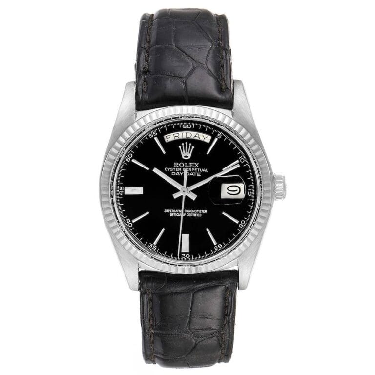A black leather strap Rolex Day-Date 1803 with a black dial, date window, and silver case.