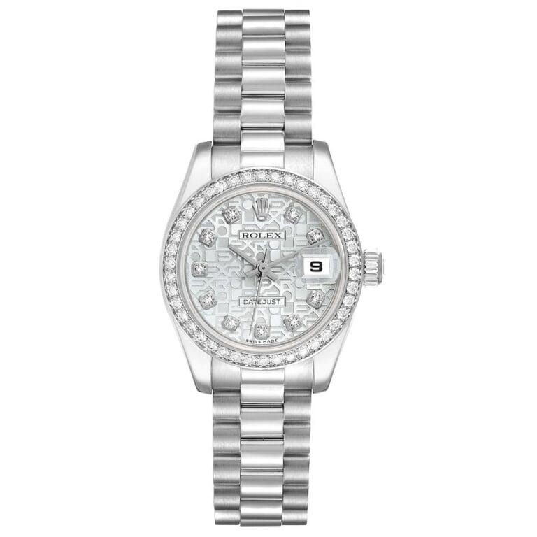 A silver Rolex Datejust wristwatch with a patterned face, diamond markers, and a metal link band.