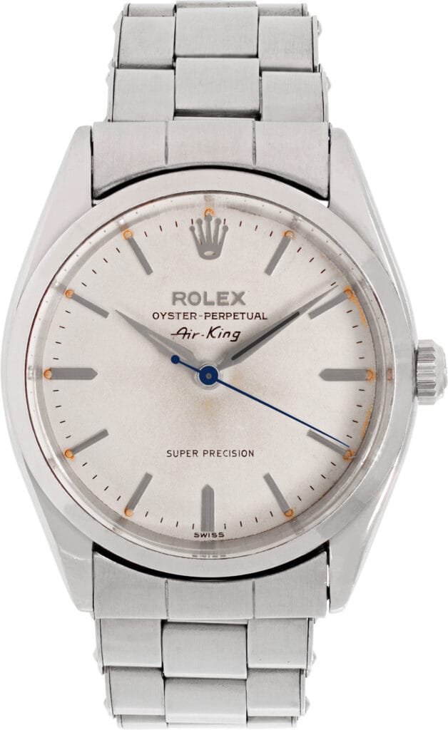 Classic silver Rolex Oyster Perpetual Air-King 6552 watch featuring a white dial and sleek metal bracelet.