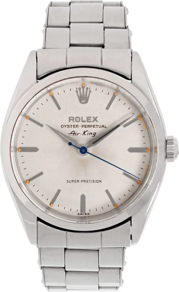 Classic silver Rolex Oyster Perpetual Air-King 6552 watch featuring a white dial and sleek metal bracelet.