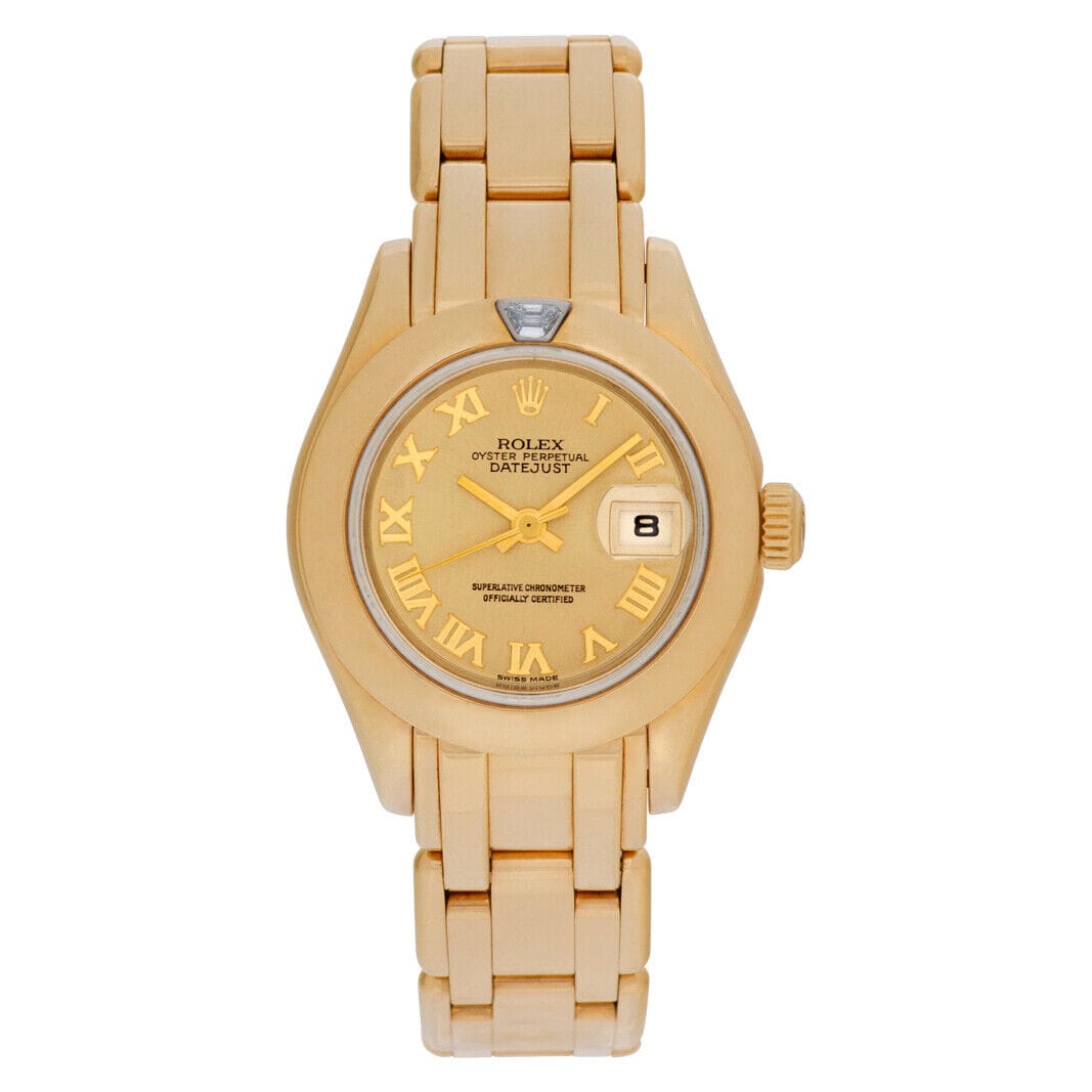 Gold Rolex Datejust 80328 wristwatch with Roman numeral markers and a date window at the 3 o’clock position.