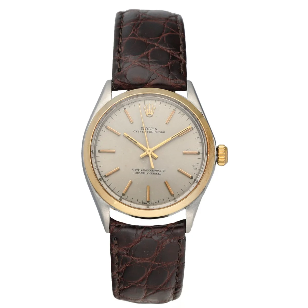 A classic Rolex Air King 1002 wristwatch featuring a brown leather strap and a silver dial with gold accents.