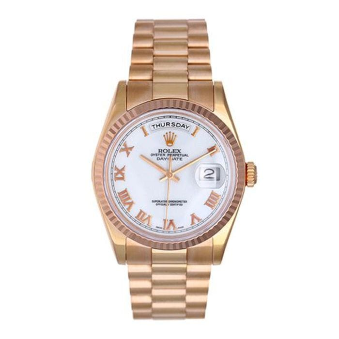 Gold Rolex President 118235 watch with a white face, Roman numerals, and a date and day display.