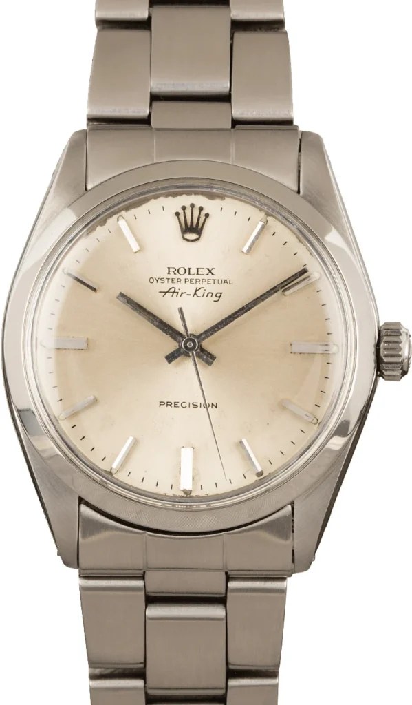 Rolex Air-King 1002 watch featuring a cream dial and stainless steel band, embodying classic elegance and timeless design.
