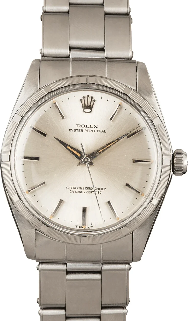Stainless steel Rolex Oyster Perpetual 1003 watch featuring a silver dial and index hour markers.