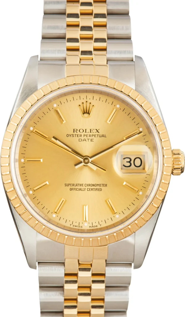 A gold and silver Rolex Oyster Perpetual Date 15223 watch displaying the date as the 30th.