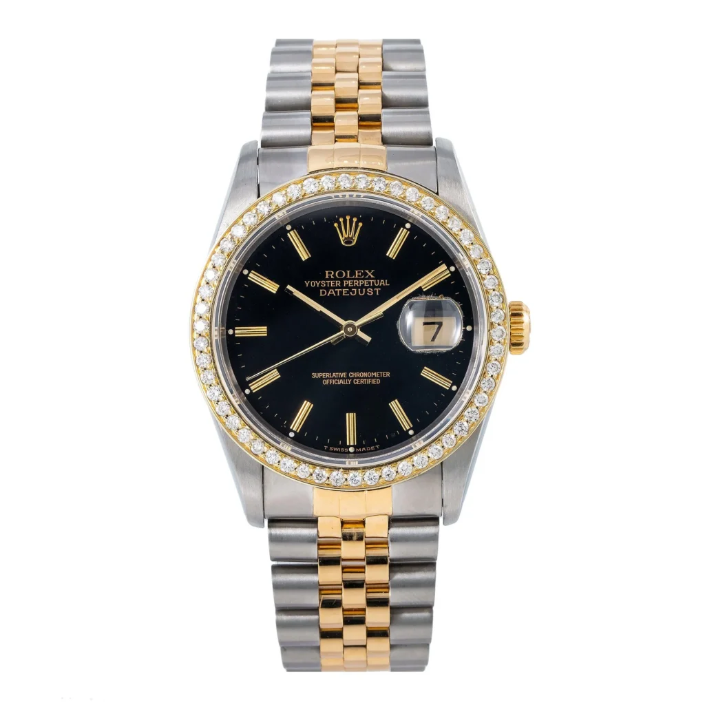 A Rolex Datejust 16233 watch with a black dial, gold and silver bracelet, and stunning diamond bezel.