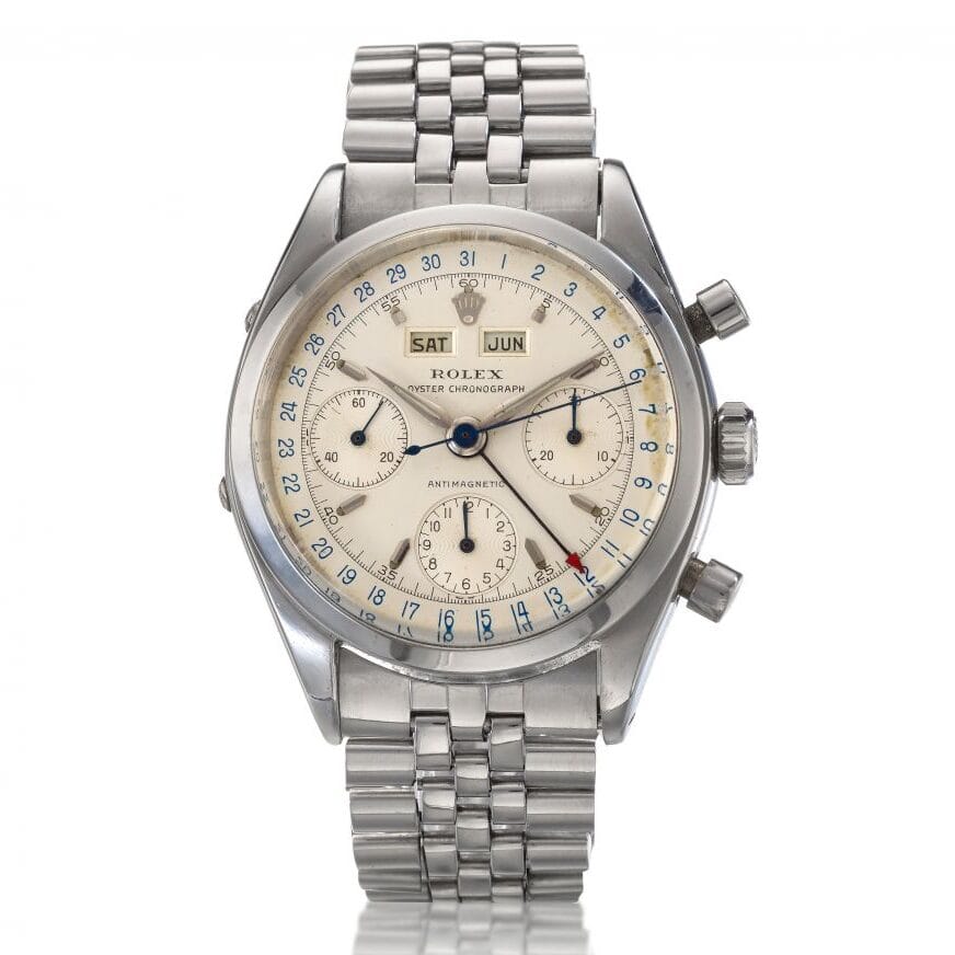A vintage Rolex Chronograph 6236 stainless steel watch with a cream dial and metal link bracelet.