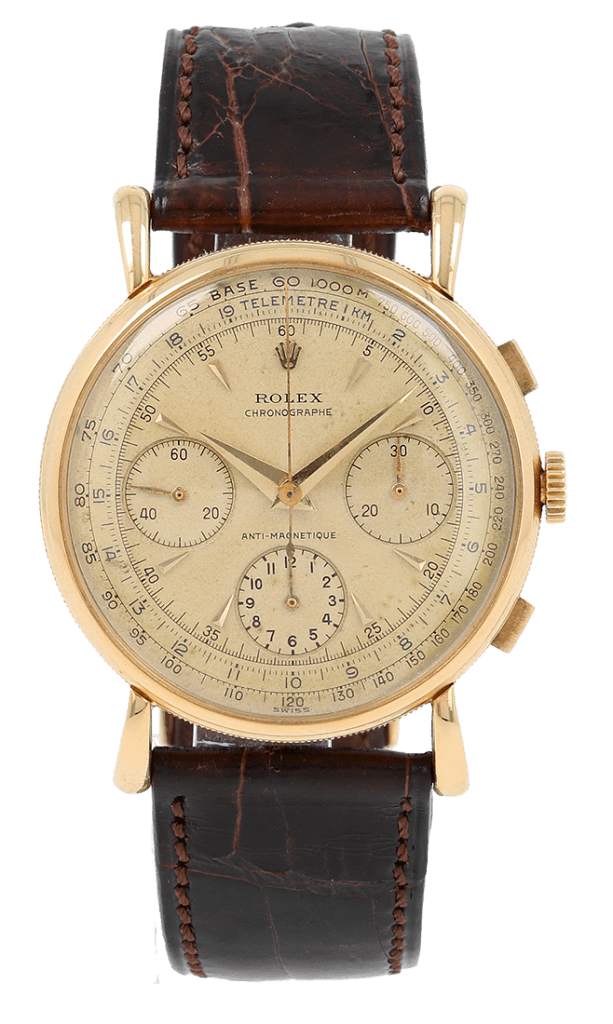 Vintage gold Rolex 9162 chronograph watch with a brown leather strap and three subdials.