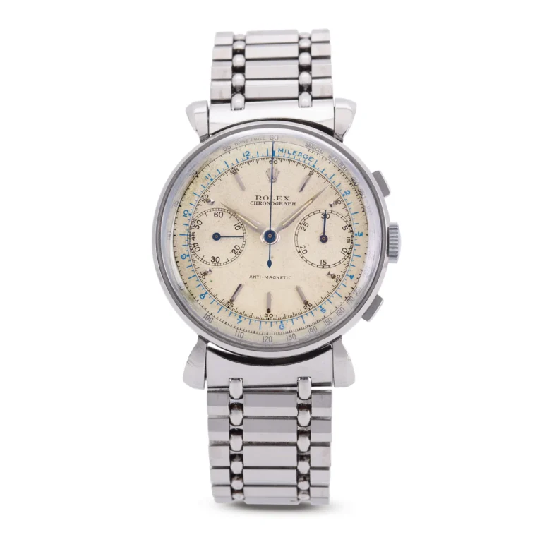 A vintage Rolex Chronograph wristwatch with a silver metal band and a cream-colored dial, this classic piece is reminiscent of the sought-after Rolex 4099 models.