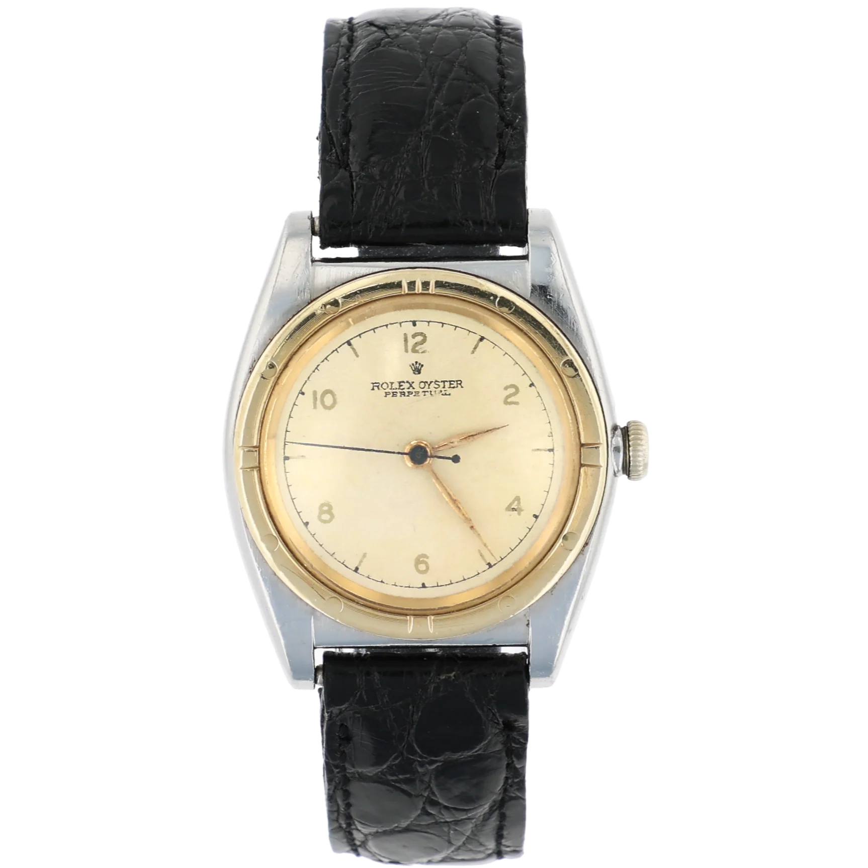 A vintage Rolex Oyster Precision 3372 watch featuring a cream dial, gold bezel, and a classic black leather strap.