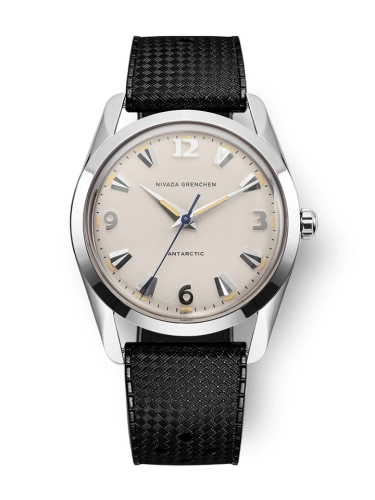 A silver Nivada Grenchen Antarctic wristwatch, model 35001M01, featuring a beige dial and black textured strap.