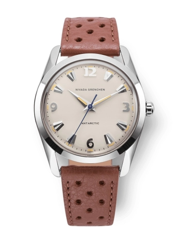 Beige-faced wristwatch with brown perforated leather strap and silver markers, reading Nivada Grenchen Antarctic 35001M41.