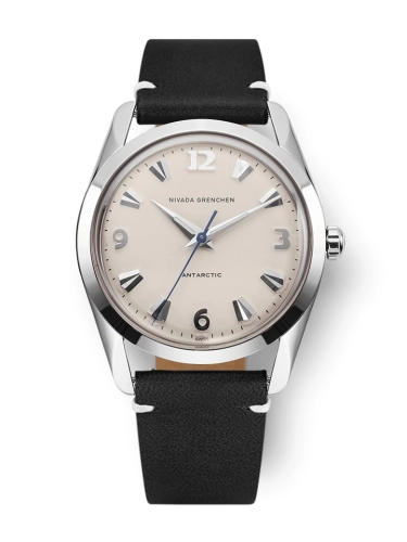 Silver Nivada Grenchen Antarctic 35004M15 wristwatch featuring a beige dial, black leather strap, and elegant silver hour markers.