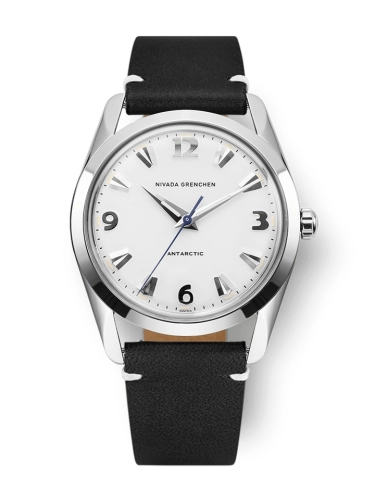 A silver Nivada Grenchen Antarctic 35005M15 watch featuring a white dial and a black leather strap.