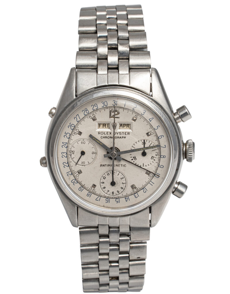 Silver Rolex Chronograph 4767 wristwatch featuring a metal band and multiple dials on the elegant watch face.