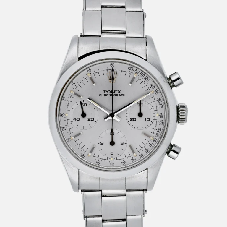 Silver Rolex chronograph 6238 watch with three subdials, metal bracelet, and two pushers on the right side.