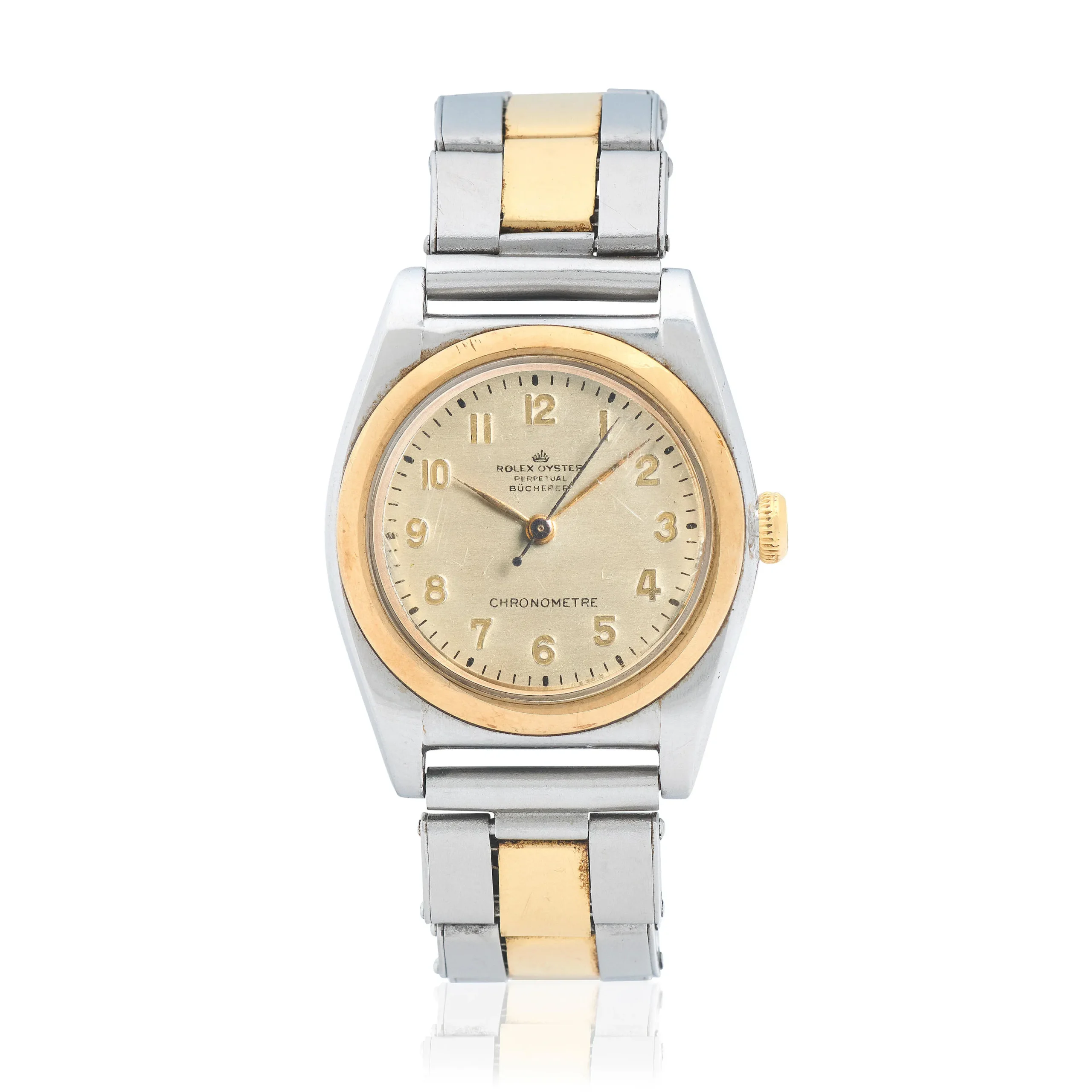 A two-tone Rolex Oyster Perpetual wristwatch featuring a gold and silver band with a round gold bezel on a cream dial. Model 3358.