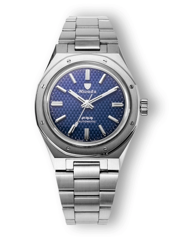 Silver Nivada Grenchen F77 wristwatch with a blue textured dial and metal link bracelet, displaying the time 10:09.