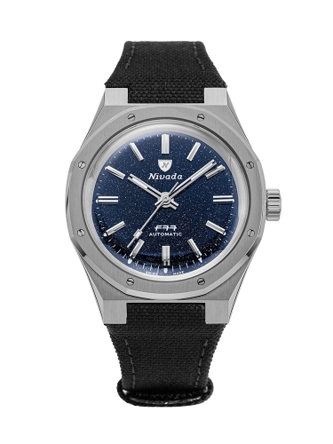 Silver Nivada Grenchen automatic wristwatch, model 68018A77-BC, with a blue starry dial and black fabric strap, shown on a white background.