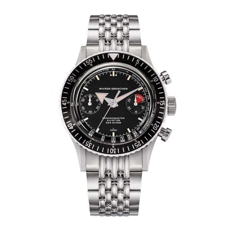 The Nivada Grenchen Chronomaster Aviator Sea Diver 86001A-BRAC is a silver stainless steel wristwatch with a black dial and bezel, featuring multiple subdials on the face.