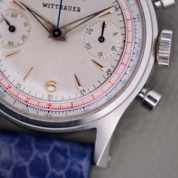 Close-up of the Wittnauer 3256 Chronograph Venus 188, showcasing its blue strap, intricate dial markings, and legendary Venus 188 movement.