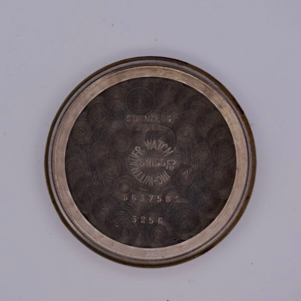 Round metallic case back for Wittnauer 3256 Chronograph Venus 188, featuring engraved serial numbers and BWC Inc. Watch Co. Swiss text; fits selected chronograph models.