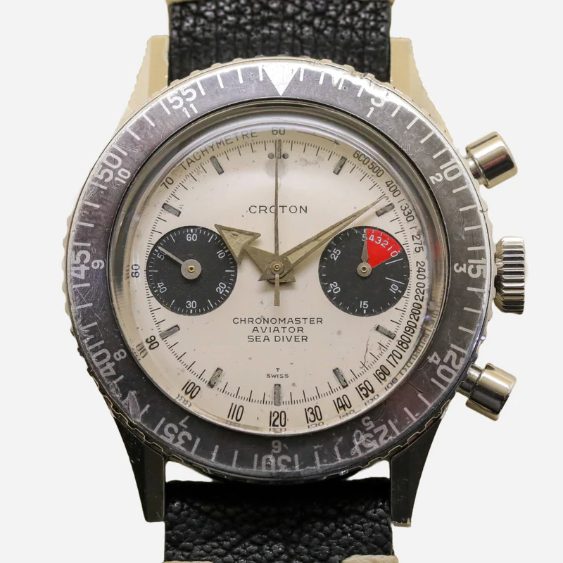 Vintage Nivada Grenchen Chronomaster Aviator Sea Diver 105-9870 watch with black leather strap and silver case.