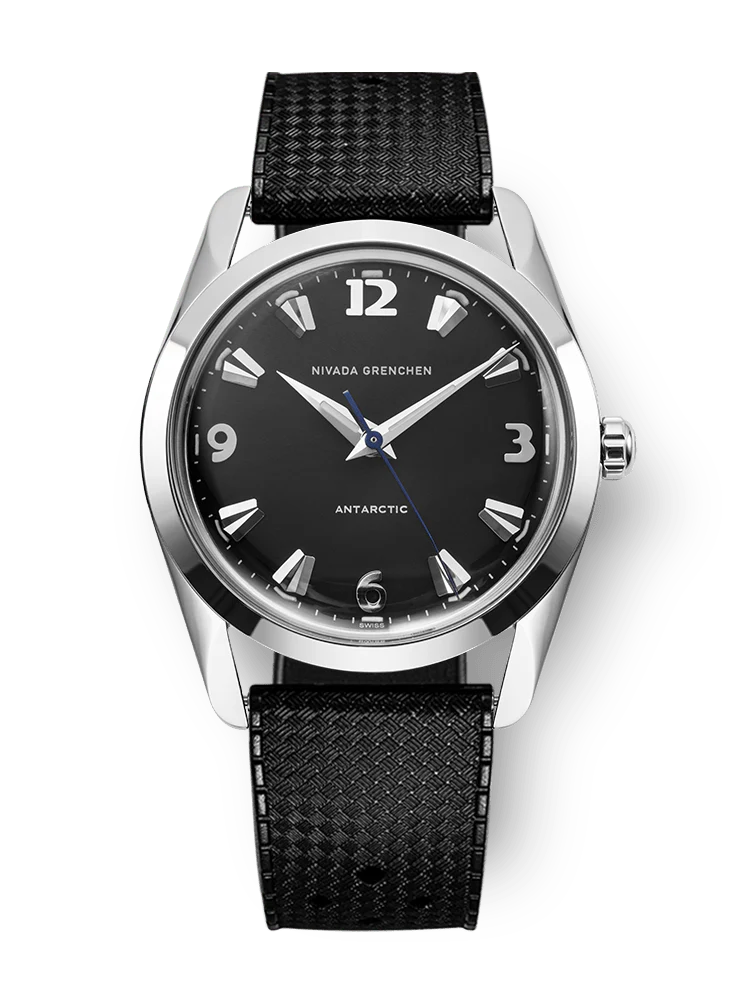 A black Nivada Grenchen Antarctic 35002M01 wristwatch featuring silver markers and a black textured strap.
