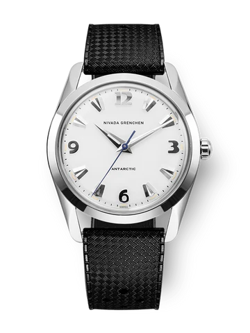 The Nivada Grenchen Antarctic 35005M01 is a silver wristwatch with a white face, black leather strap, and silver hands, elegantly displaying 10:10.