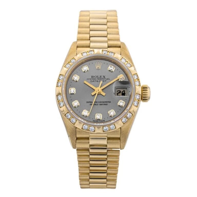 Gold Rolex Datejust 69258 watch with diamond hour markers and bezel, grey dial, and date display at the 3 o’clock position.