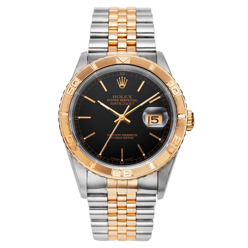 A Rolex Datejust 16263 watch with a black dial, gold bezel, and a two-tone silver and gold metal bracelet.