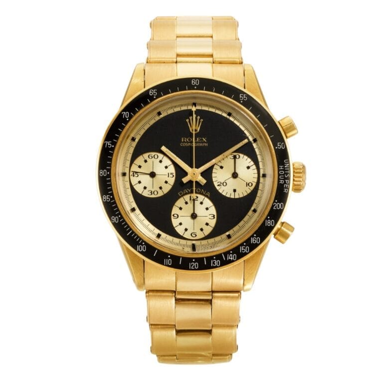 Gold Rolex Cosmograph Daytona 6264 watch featuring a black and gold dial, three subdials, and a luxurious gold metal bracelet.