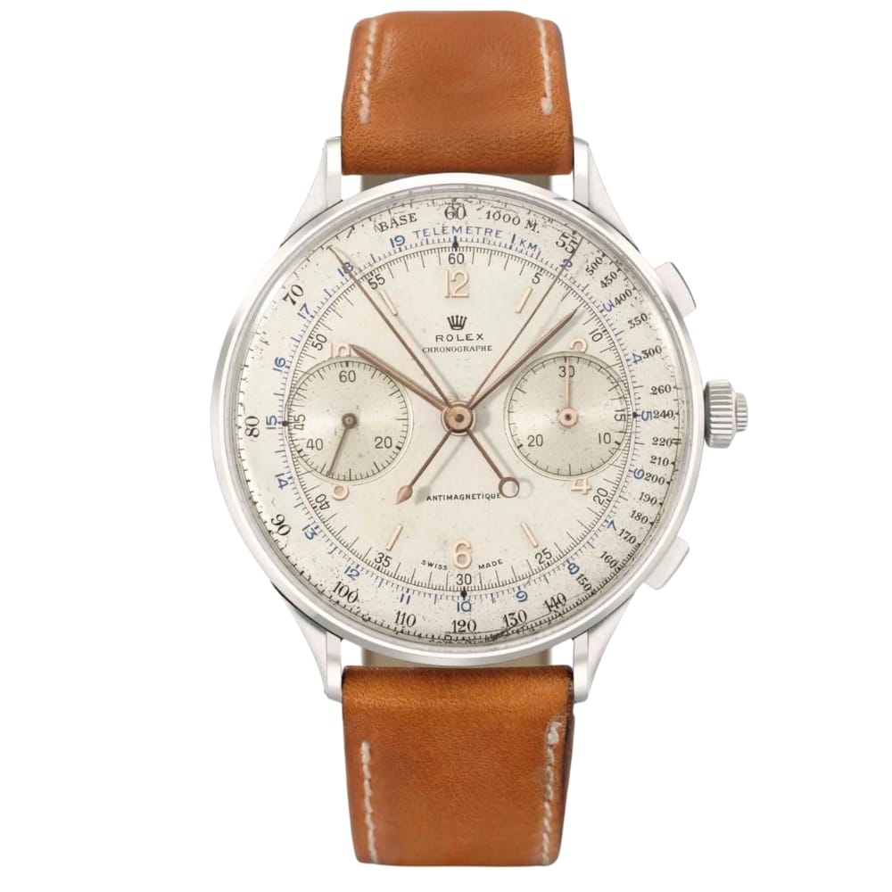 Vintage Rolex Chronograph 4113 watch with a brown leather strap and a white dial featuring multiple subdials and markers.