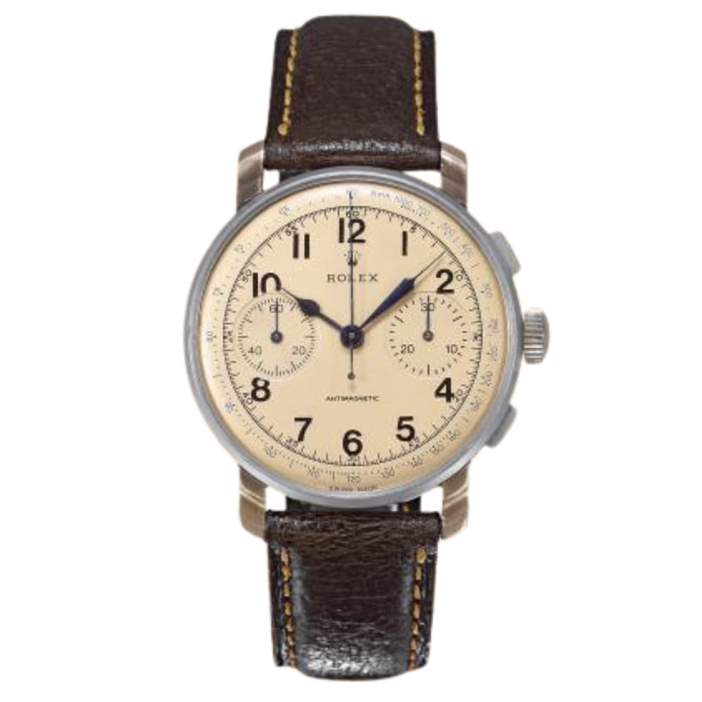A vintage Rolex chronograph watch with a beige dial, black numerals, and a brown leather strap.