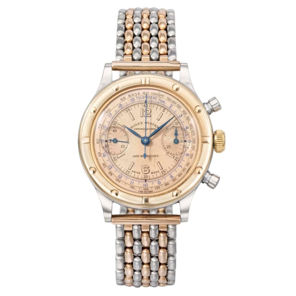 A two-tone gold and silver wristwatch with a round face, chronograph dials, and a metal link bracelet inspired by the classic Rolex Zerograph 3668.