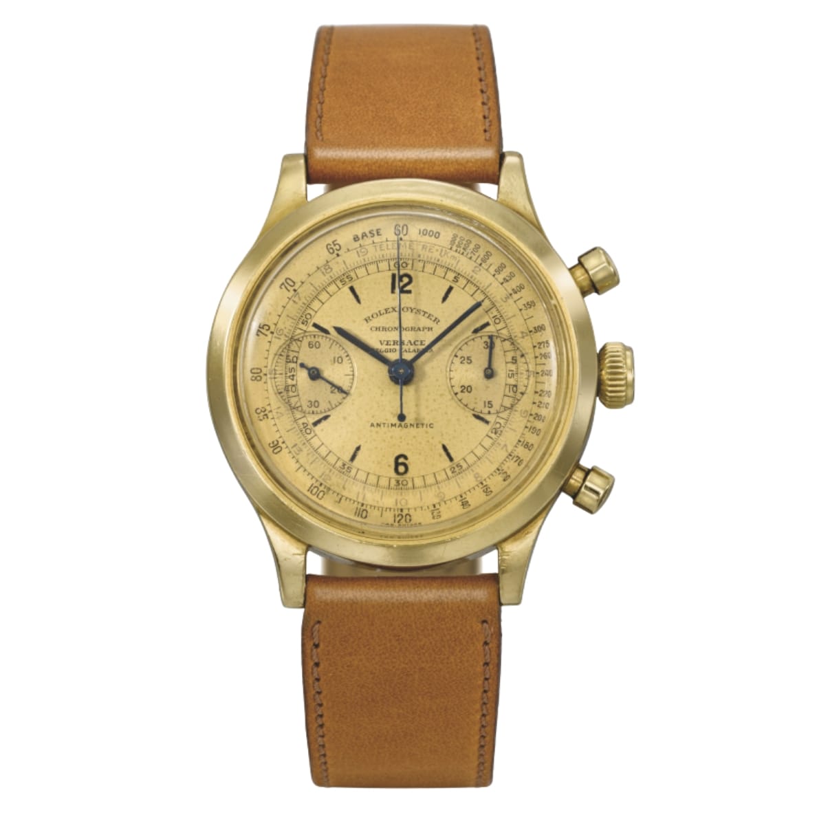 A vintage gold Rolex Chronograph 3525 wristwatch with a tan leather strap and detailed dial markings.