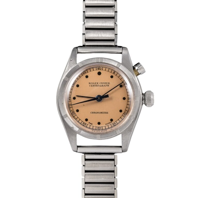 A vintage Rolex 3462 Oyster Chronograph watch featuring a salmon dial and metal bracelet.