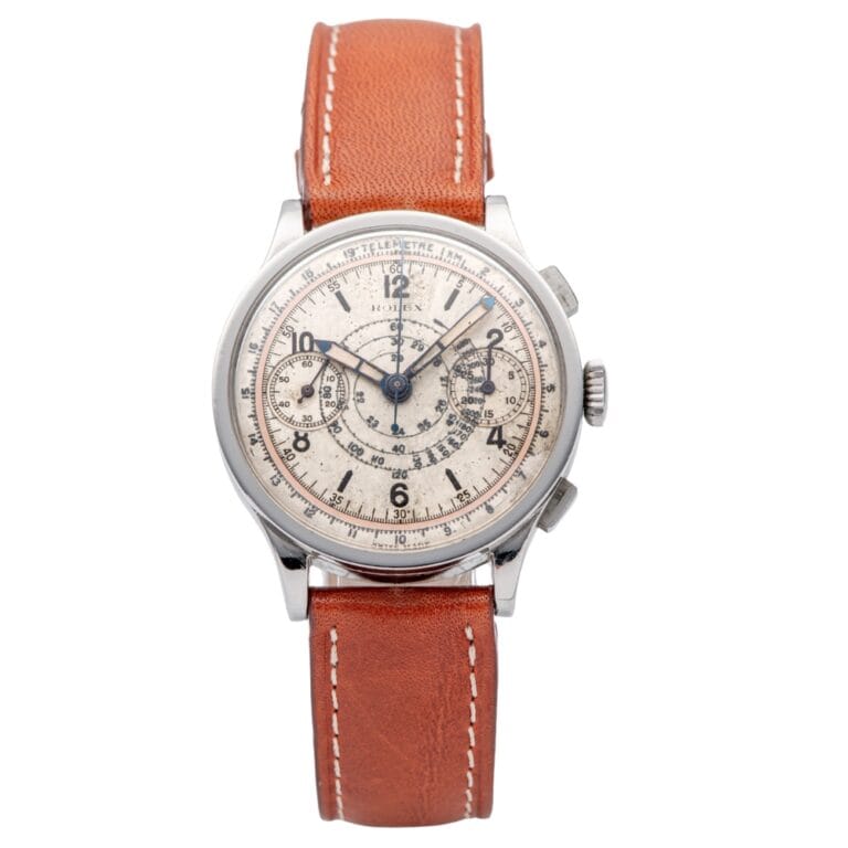 Vintage Rolex Chronograph wristwatch featuring a brown leather strap and detailed white dial, inspired by the classic Chronograph 2508 design.