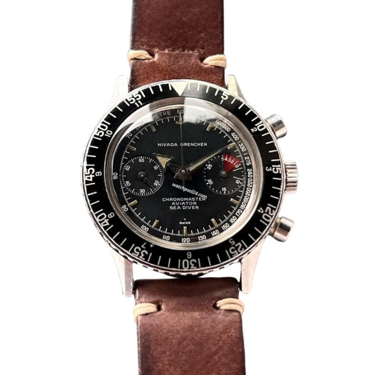 A Nivada Grenchen Chronomaster Aviator Sea Diver 105/9855 watch with a black dial and brown leather strap.