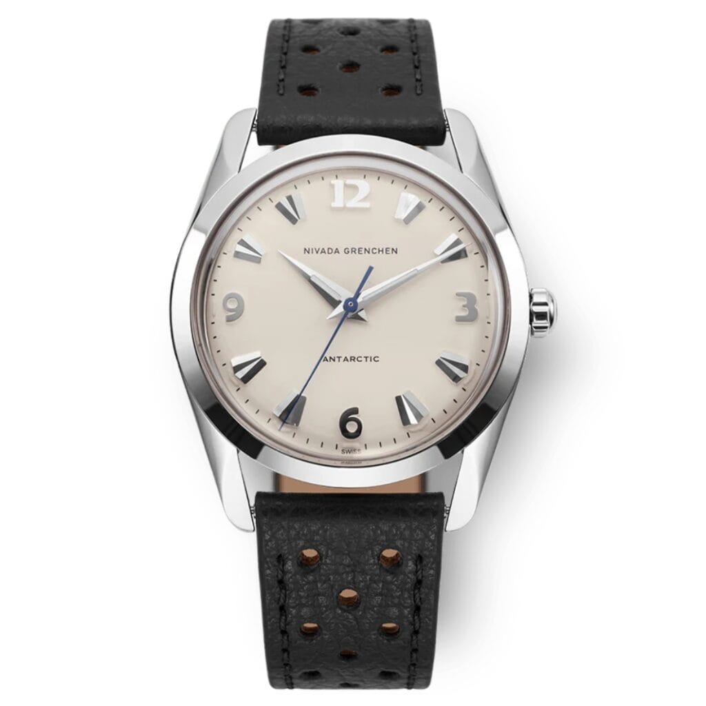 A silver Nivada Grenchen Antarctic 35005M41 watch with a beige dial and black perforated leather strap.