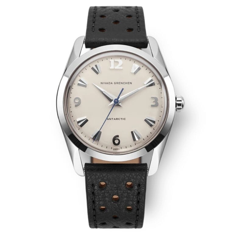 A silver Nivada Grenchen Antarctic 35005M41 watch with a beige dial and black perforated leather strap.