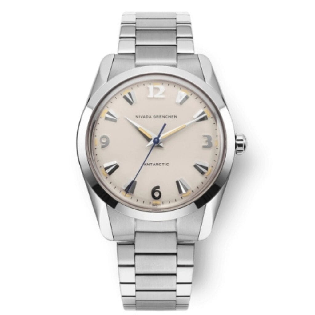 A silver wristwatch inspired by the Nivada Grenchen Antarctic, featuring a beige dial, silver hour markers, and a sleek metal link bracelet. Model: 35001M20.