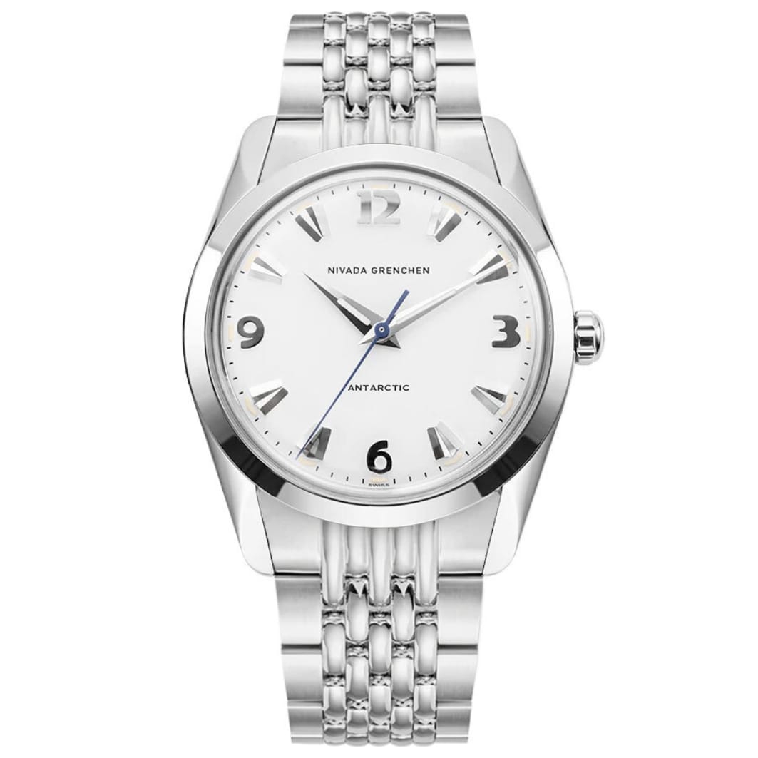 Silver Nivada Grenchen Antarctic 35005M04 wristwatch featuring a white dial, silver hour markers, and a sleek metal link band.