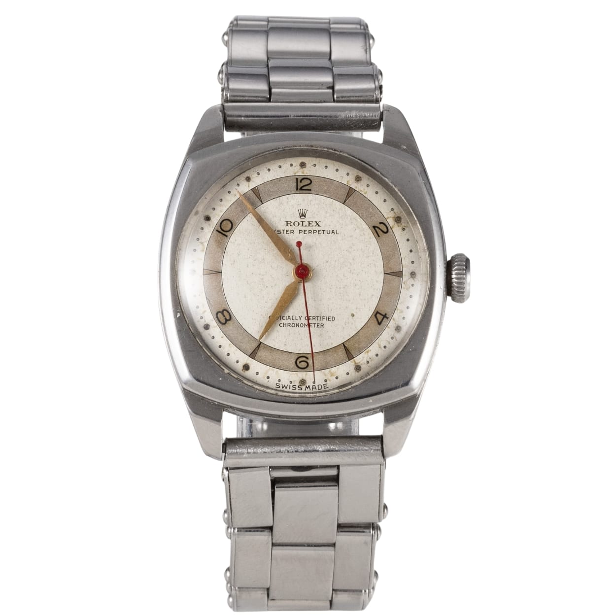 A vintage Rolex Oyster Perpetual wristwatch with a round white dial, silver case, and metal link bracelet. Model 4961.