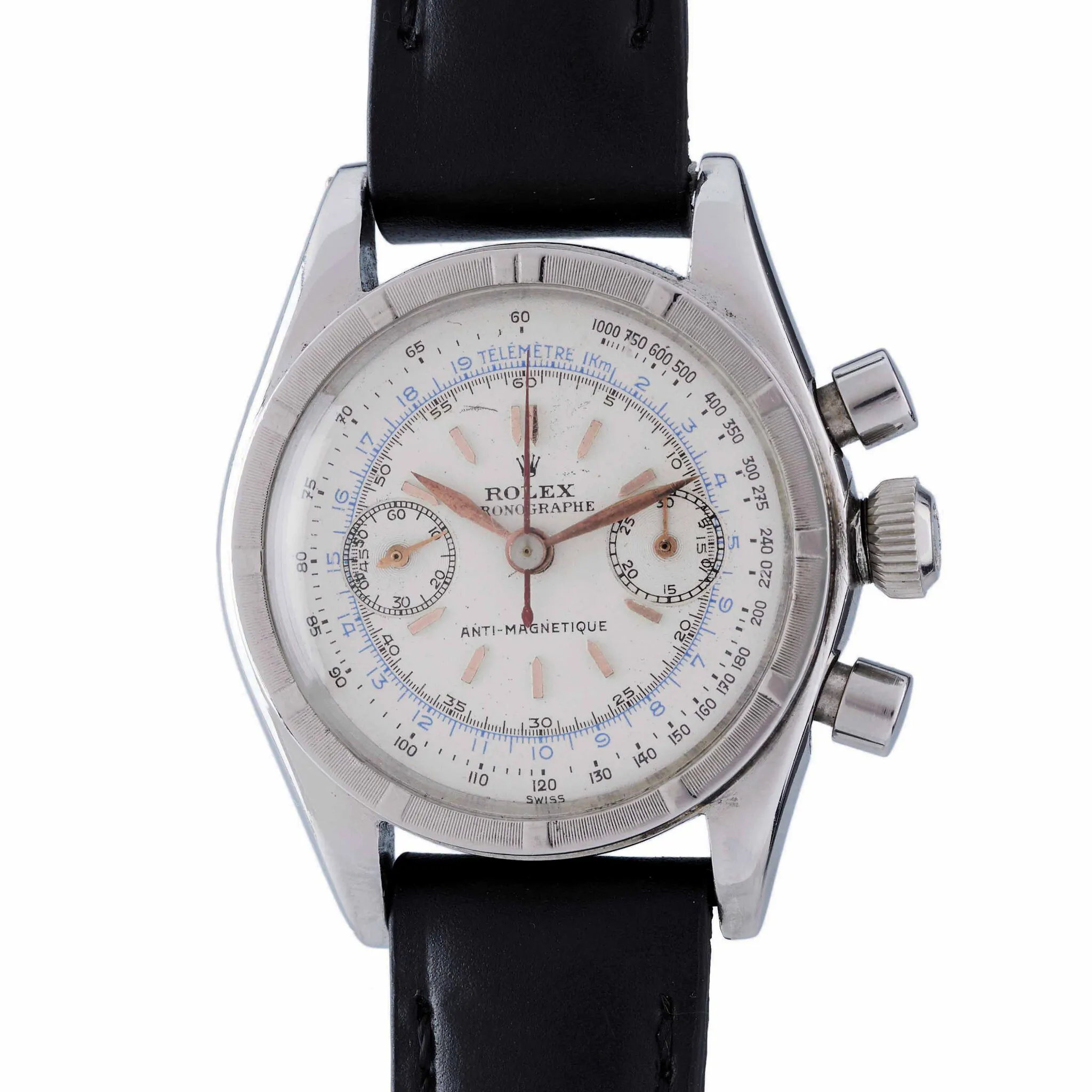 A vintage Rolex chronograph 3181 watch with a white dial, black strap, and silver case.